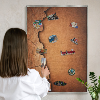Souvenir magnet display board with a silver frame Wooden texture