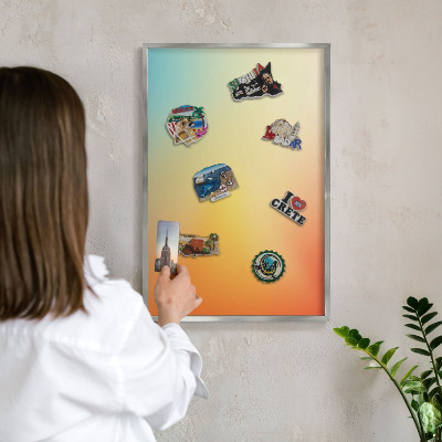 Souvenir magnet display board with a silver frame Color transition