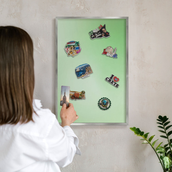 Souvenir magnet display board with a silver frame Green harmony