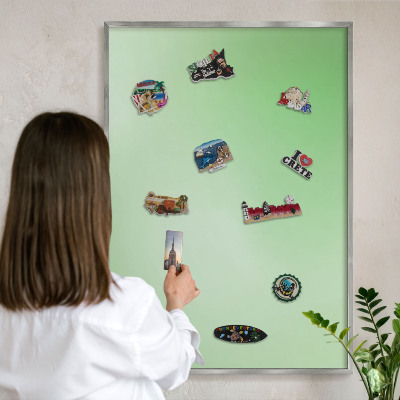 Souvenir magnet display board with a silver frame Green harmony
