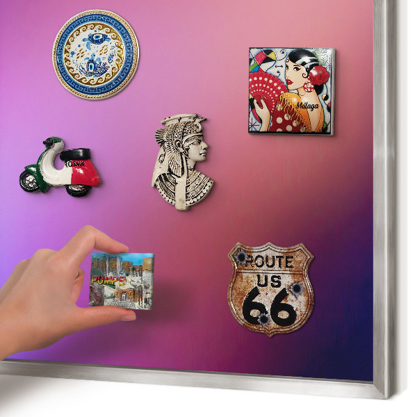 Souvenir magnet display board with a silver frame Colors of harmony
