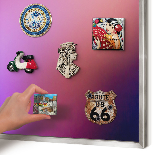 Souvenir magnet display board with a silver frame Colors of harmony