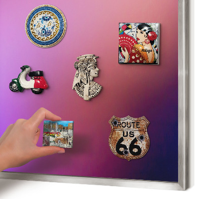 Souvenir magnet display board with a silver frame Colors of harmony