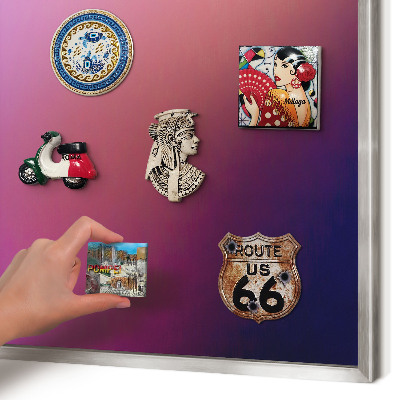 Souvenir magnet display board with a silver frame Colors of harmony