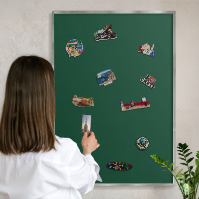 Souvenir magnet display board with a silver frame Bottle green