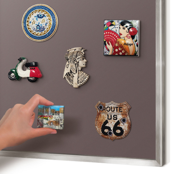 Souvenir magnet display board with a silver frame Faded brown