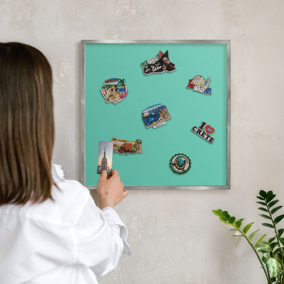 Souvenir magnet display board with a silver frame Strong mint