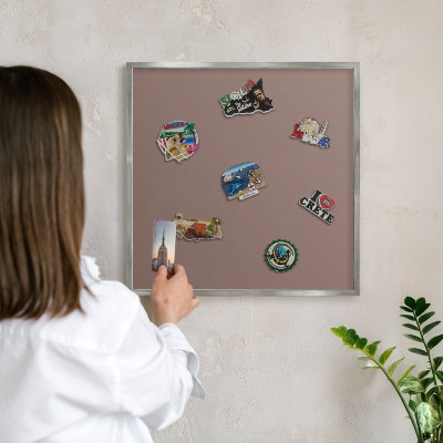 Souvenir magnet display board with a silver frame Pastel brown