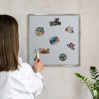 Souvenir magnet display board with a silver frame Light gray