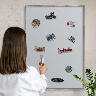 Souvenir magnet display board with a silver frame Light gray