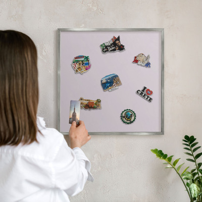 Souvenir magnet display board with a silver frame Light lilac