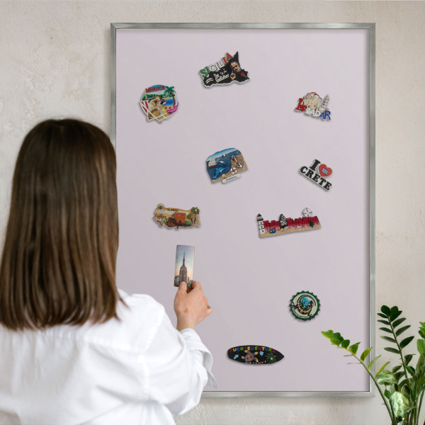 Souvenir magnet display board with a silver frame Light lilac