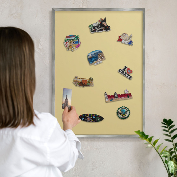 Souvenir magnet display board with a silver frame Beige-yellow