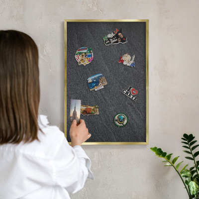Metal magnet board with a gold frame Gray texture