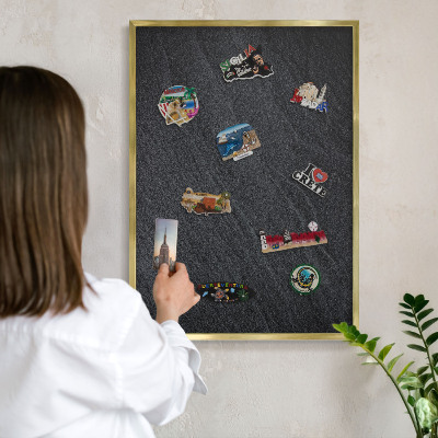 Metal magnet board with a gold frame Gray texture