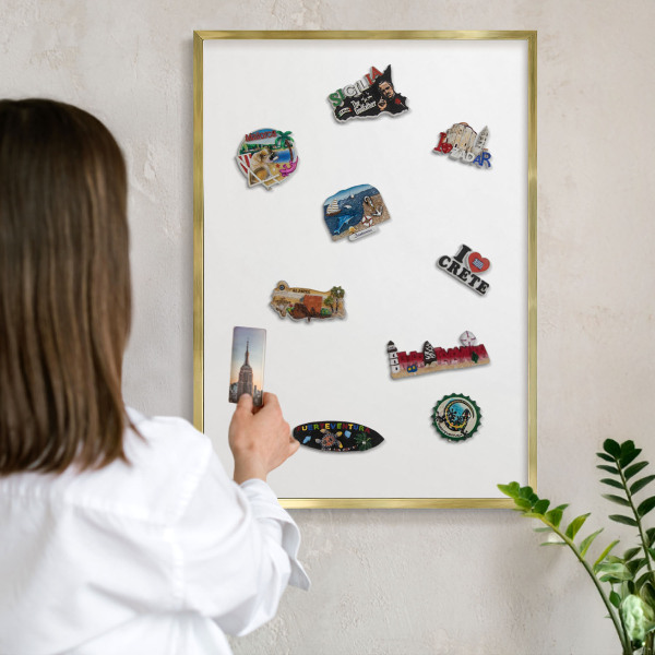 Magnetic board for magnets in a gold frame Pure white