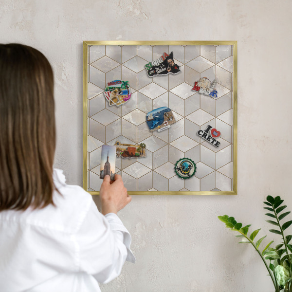 Magnetic board for magnets in a gold frame Cubic background
