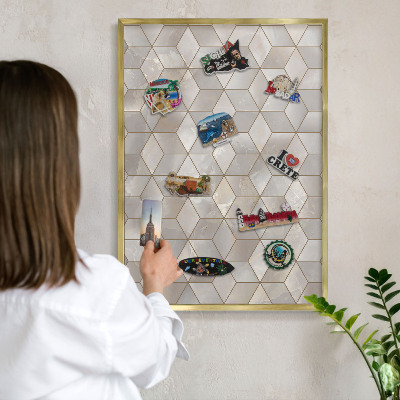 Magnetic board for magnets in a gold frame Cubic background