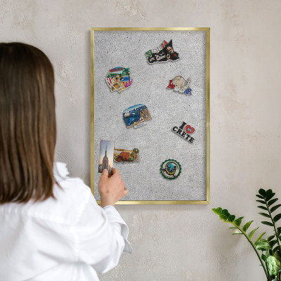 Metal magnet board with a gold frame Gray texture