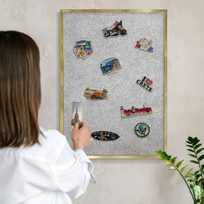 Metal magnet board with a gold frame Gray texture