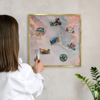 Metal magnet board with a gold frame Colorful abstraction