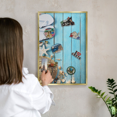 Magnetic board for magnets in a gold frame Holiday atmosphere