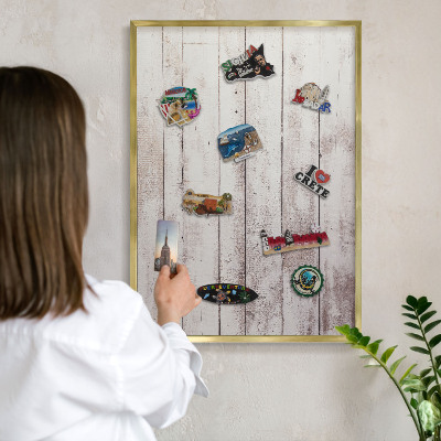 Metal magnet board with a gold frame Light wood