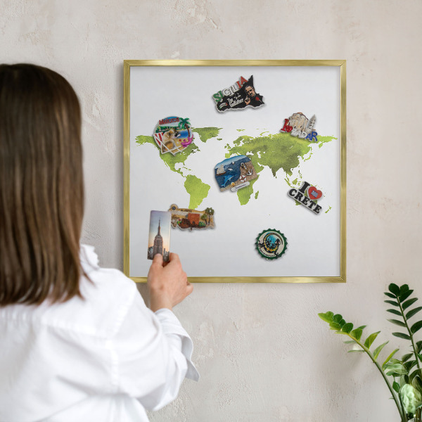 Metal magnet board with a gold frame Green map