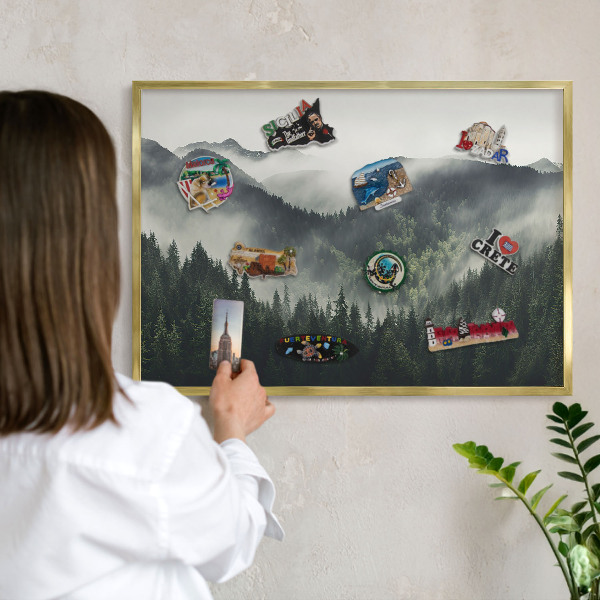 Metal magnet board with a gold frame Green mountains