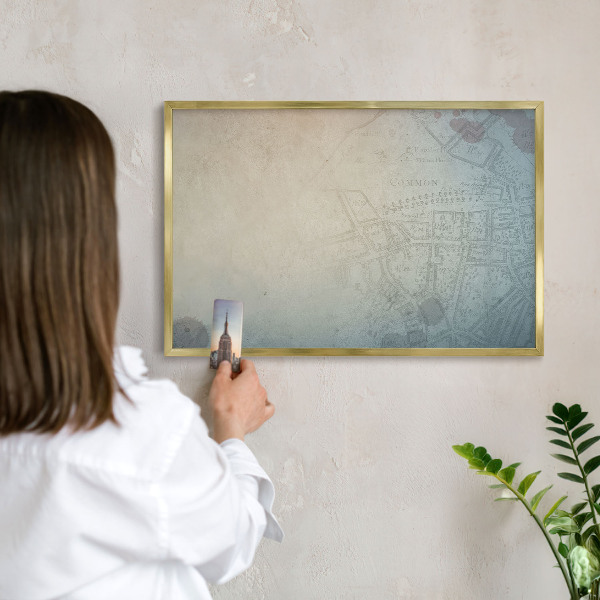 Metal magnet board with a gold frame Old map