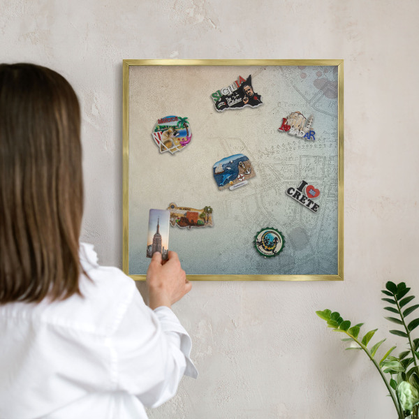 Metal magnet board with a gold frame Old map