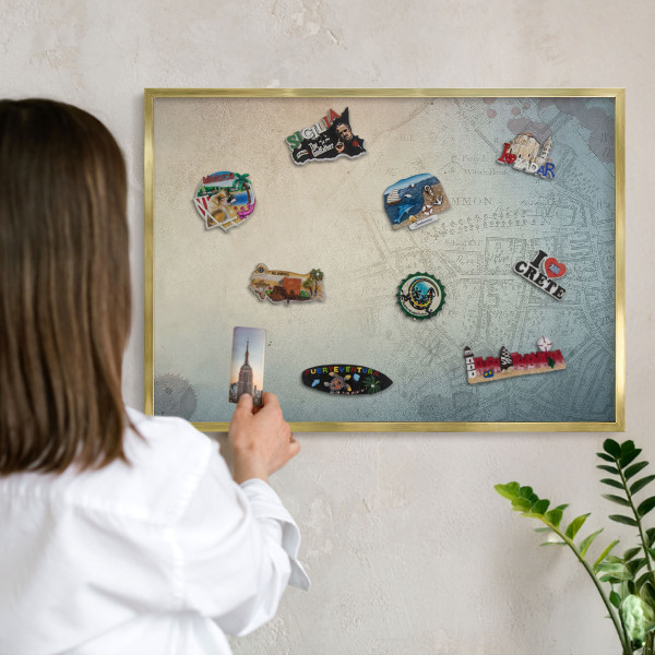 Metal magnet board with a gold frame Old map