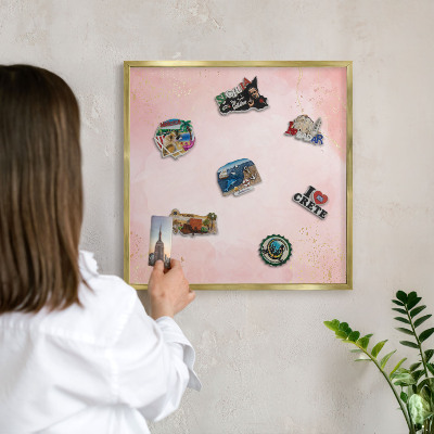 Magnetic board for magnets in a gold frame Subtle elegance