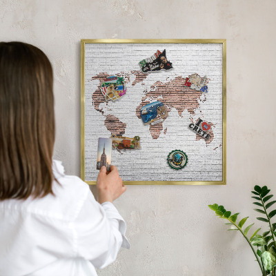Metal magnet board with a gold frame Brick map