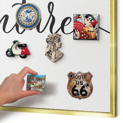 Metal magnet board with a gold frame Adventure written