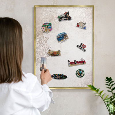 Metal magnet board with a gold frame Ethnic patterns