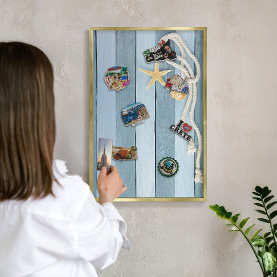 Metal magnet board with a gold frame Maritime climate