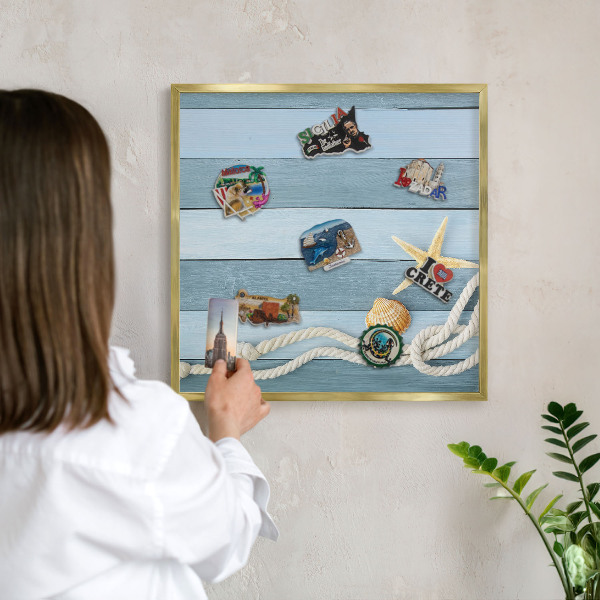 Metal magnet board with a gold frame Maritime climate