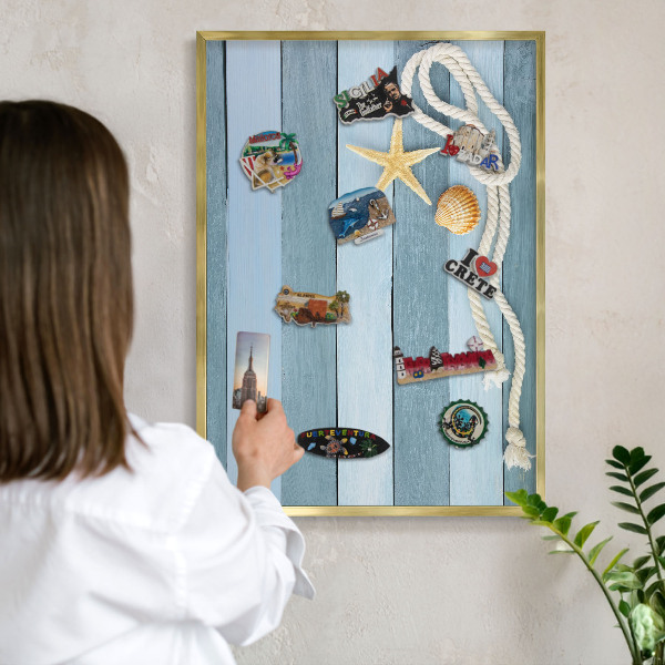 Metal magnet board with a gold frame Maritime climate