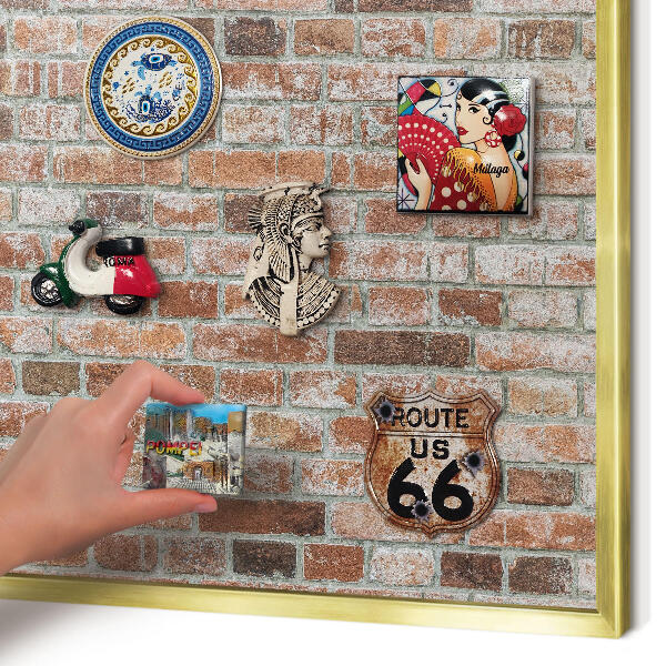 Metal magnet board with a gold frame Brick wall