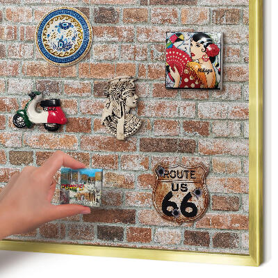 Metal magnet board with a gold frame Brick wall