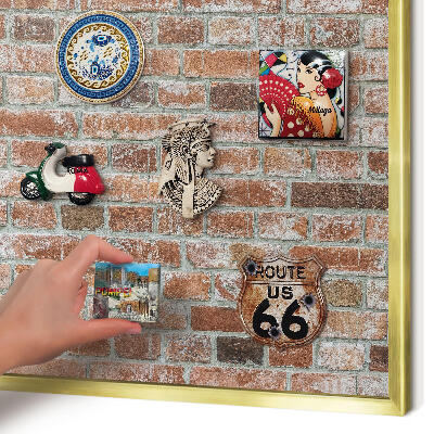 Metal magnet board with a gold frame Brick wall