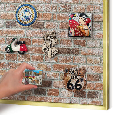 Metal magnet board with a gold frame Brick wall