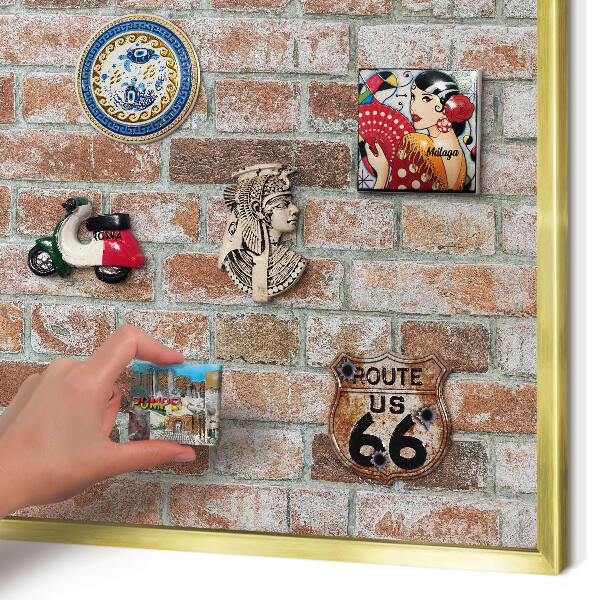 Metal magnet board with a gold frame Brick wall