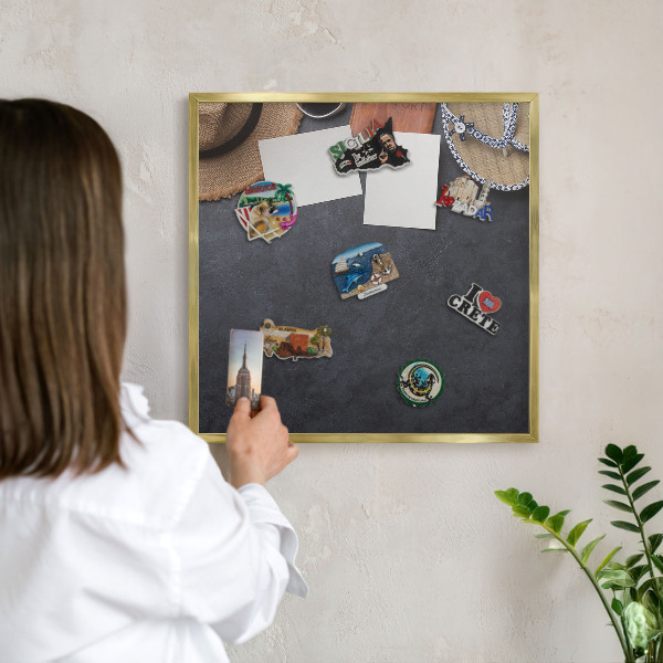 Metal magnet board with a gold frame Holiday atmosphere