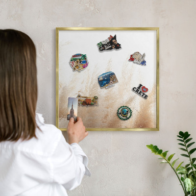 Metal magnet board with a gold frame Essential grasses