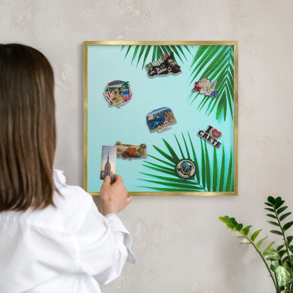 Metal magnet board with a gold frame Green leaves
