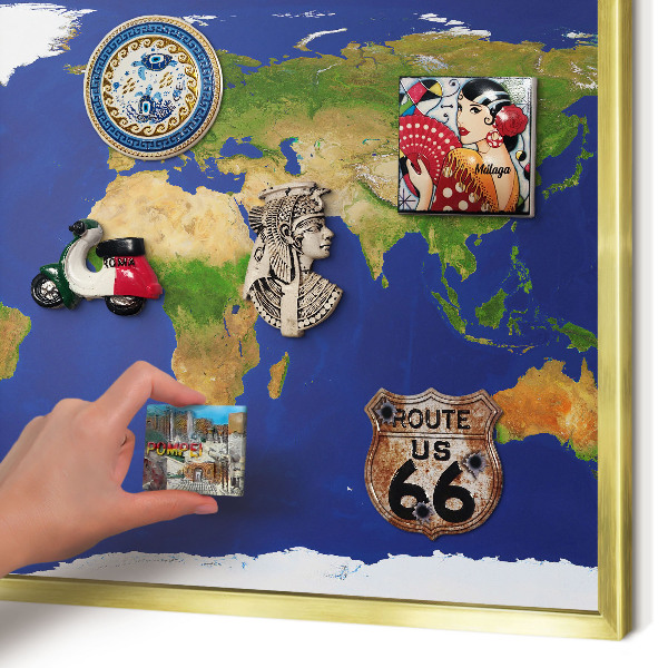 Metal magnet board with a gold frame Mapping the globe