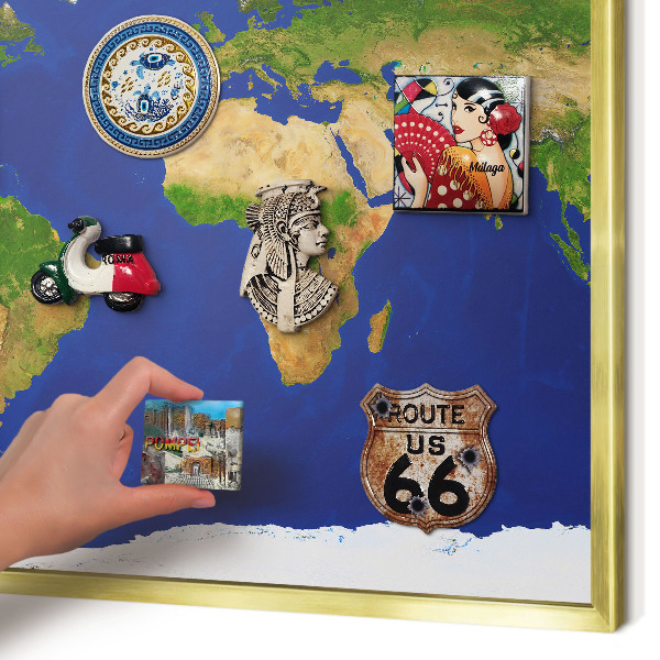 Metal magnet board with a gold frame Mapping the globe