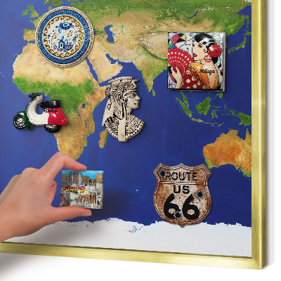 Metal magnet board with a gold frame Mapping the globe